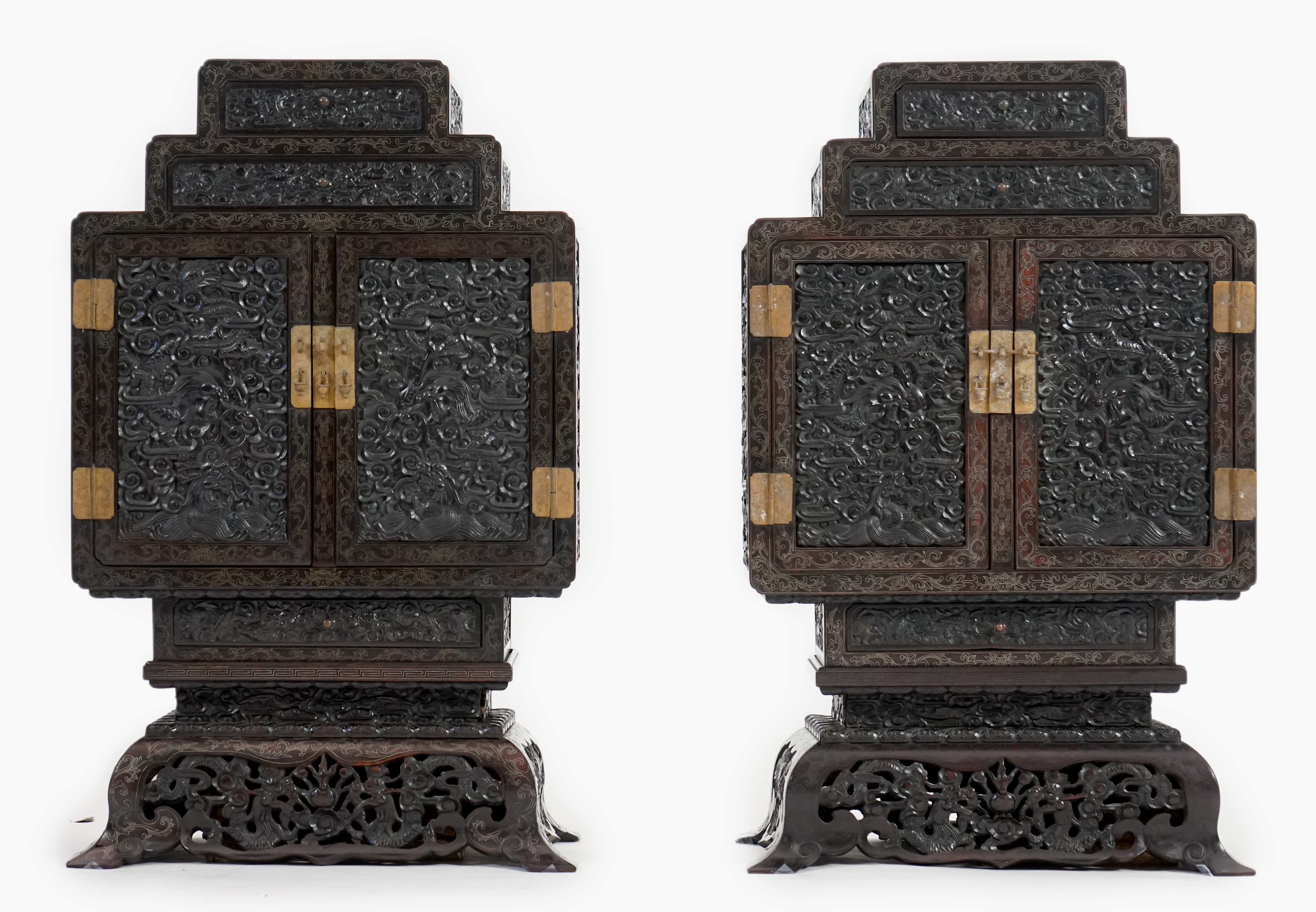 An important pair of Chinese carved zitan and silver wire inlaid ‘cloud and dragon’ curio cabinets and stands, duobaoge, probably Imperial, late Qing dynasty